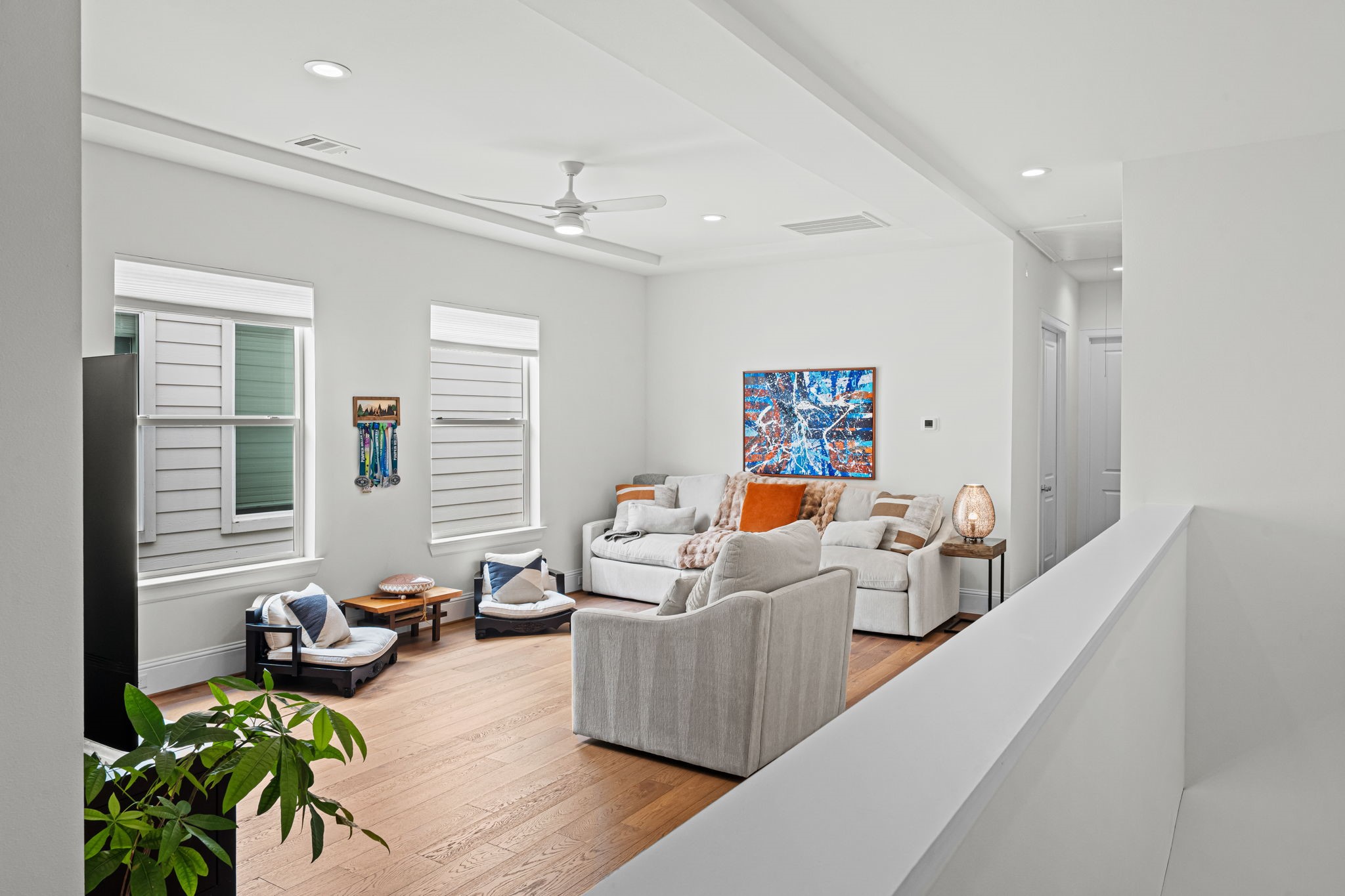 533 West 27th Street Houston, TX 77008 - Photo 17 of 22 Spacious upstairs game room offers flexible living space ideal for media, play, fitness, or a secondary lounge, complete with wood flooring extended throughout the second level.