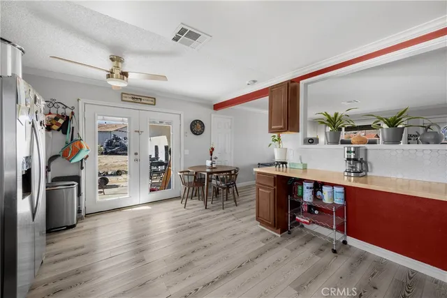 a view of a kitchen and dining room
