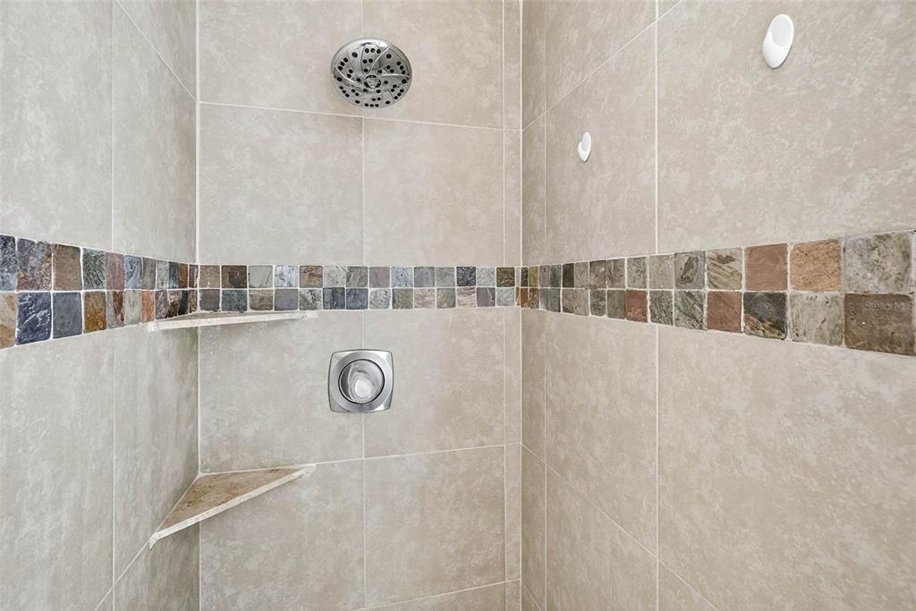 13250 Ridge Road, Unit 21 Largo, FL 33778 - Photo 8 of 36 a view of a bathroom with a shower