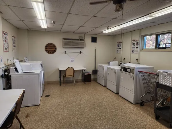 a view of a room with dryer and washer
