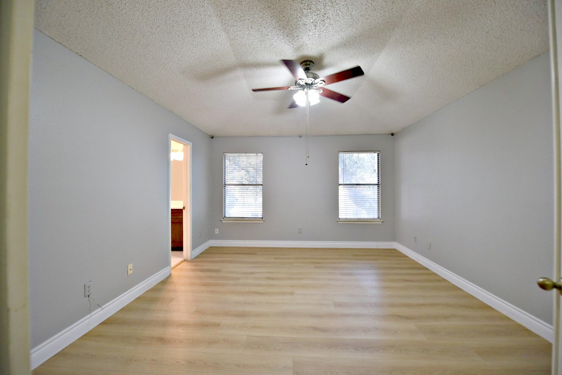 12903 Humphrey Drive Austin, TX 78729 - Photo 12 of 20 a view of empty room with window