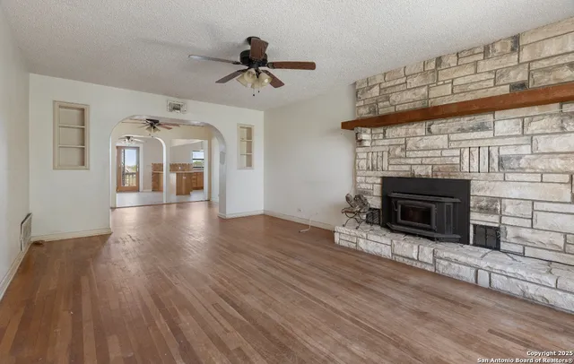 a view of an empty room and window