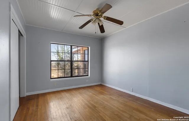 a view of a backyard of the house