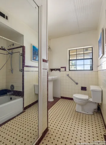 a view of a backyard with sitting area