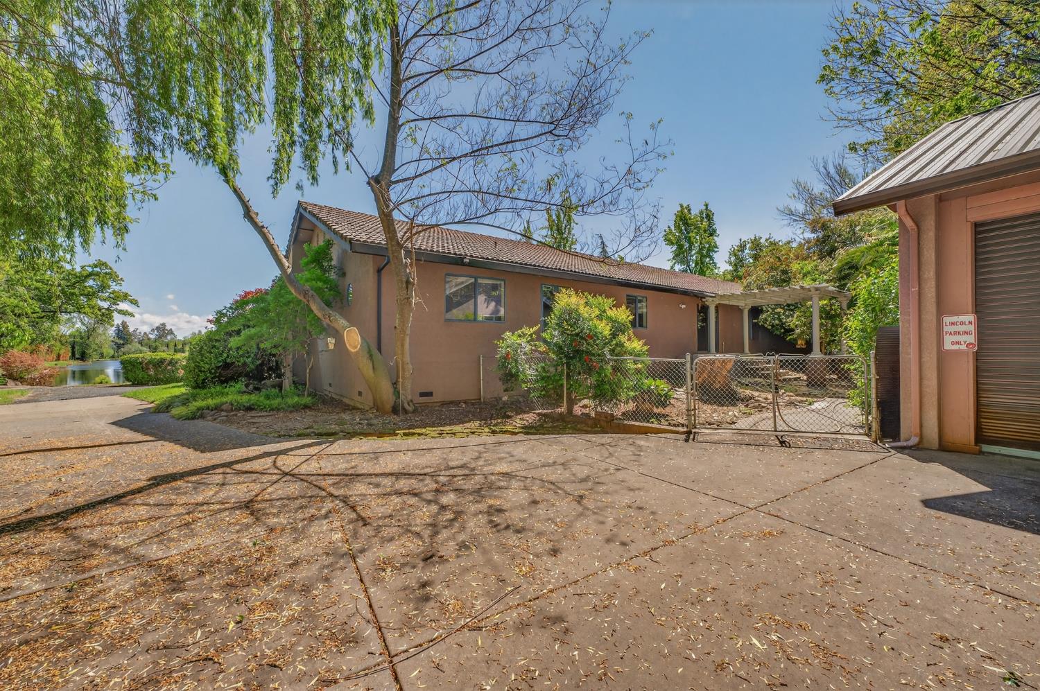 10665 Mt Vernon Road Auburn, CA 95603 - Photo 15 of 45 a view of a house with backyard and sitting area