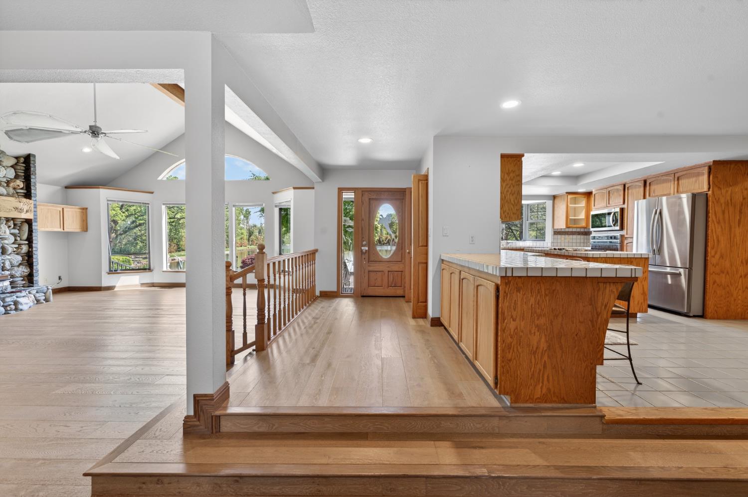 10665 Mt Vernon Road Auburn, CA 95603 - Photo 19 of 45 a living room with stainless steel appliances kitchen island granite countertop furniture and a kitchen view