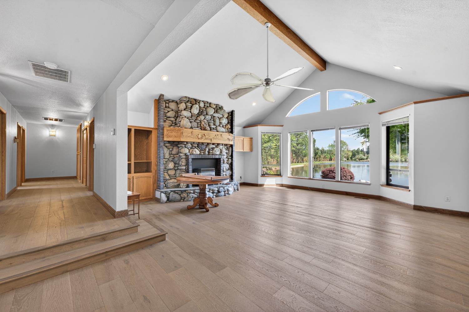 10665 Mt Vernon Road Auburn, CA 95603 - Photo 20 of 45 a view of a livingroom with furniture a fireplace and window