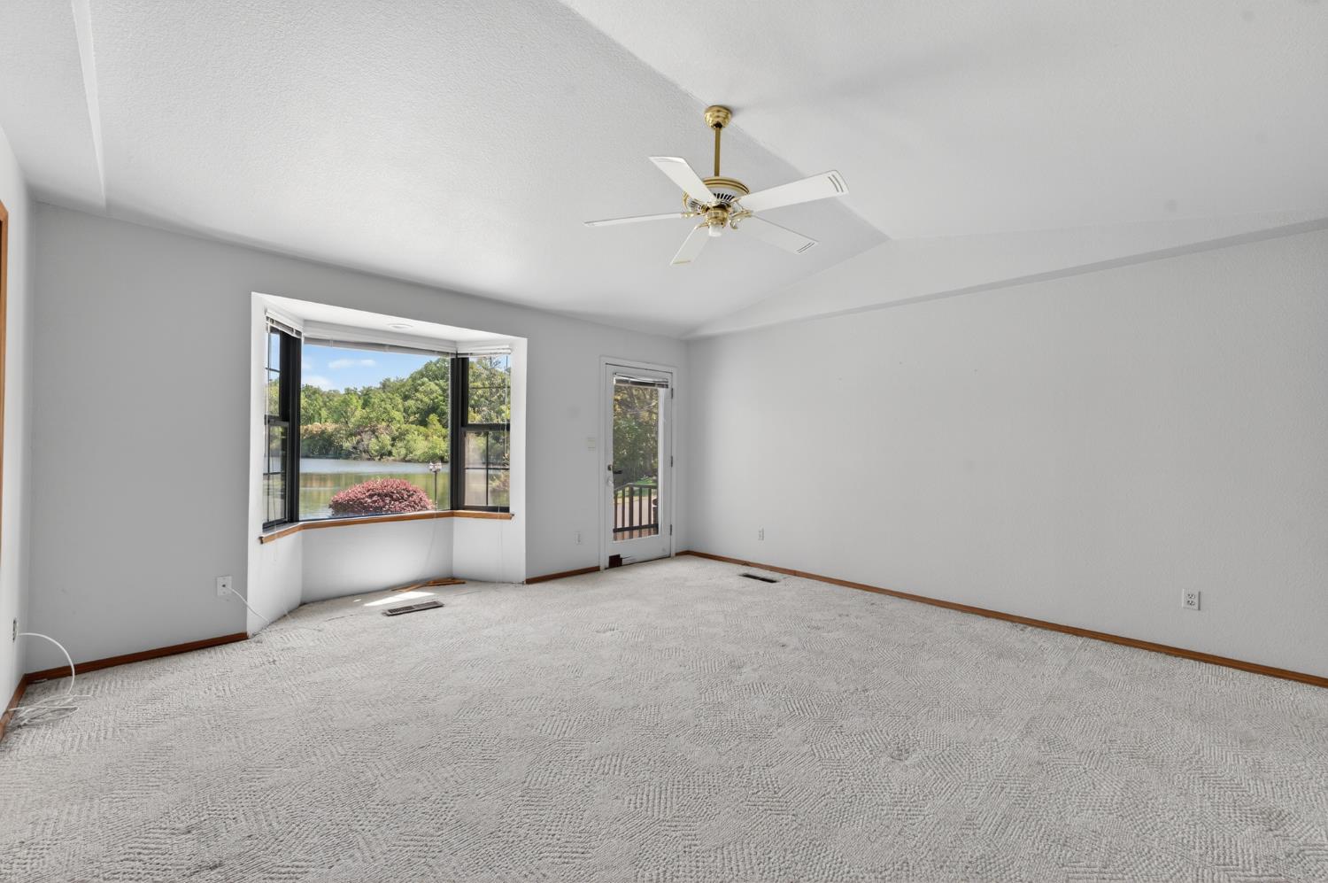 10665 Mt Vernon Road Auburn, CA 95603 - Photo 41 of 45 an empty room with a empty space and windows