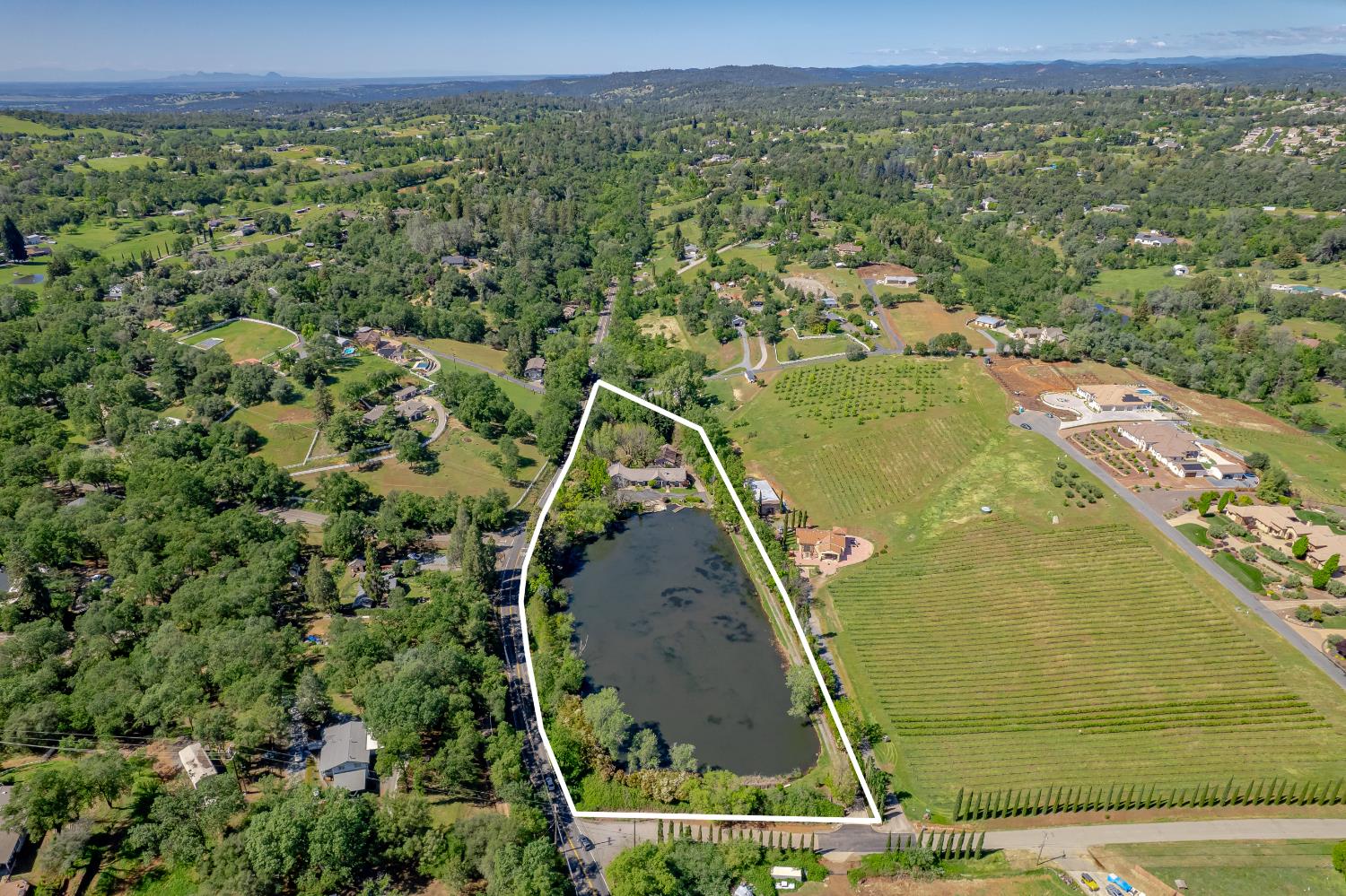 10665 Mt Vernon Road Auburn, CA 95603 - Photo 6 of 45 an aerial view of a house with a yard
