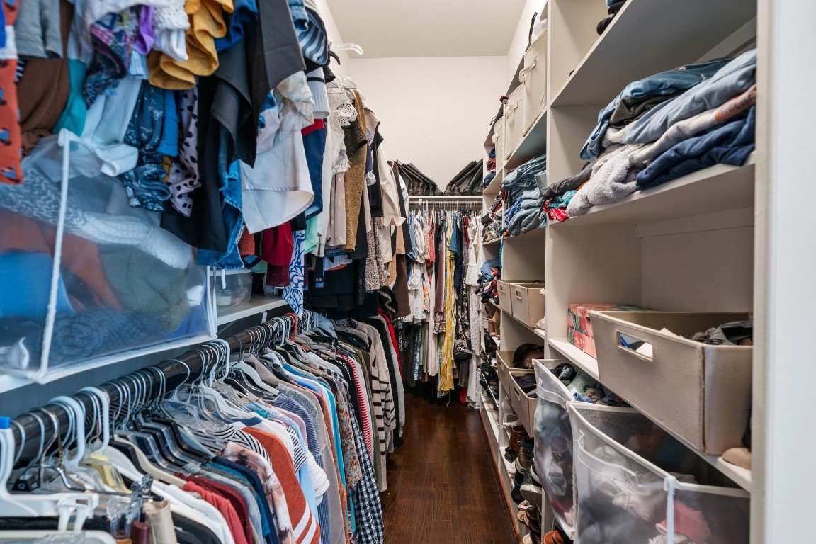 4205 Koehler Street, Unit B Houston, TX 77007 - Photo 18 of 28 a view of walk in closet with clothes