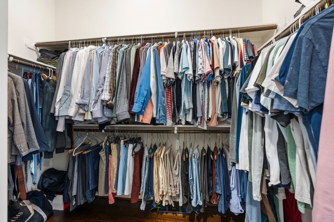 4205 Koehler Street, Unit B Houston, TX 77007 - Photo 19 of 28 a view of walk in closet with clothes