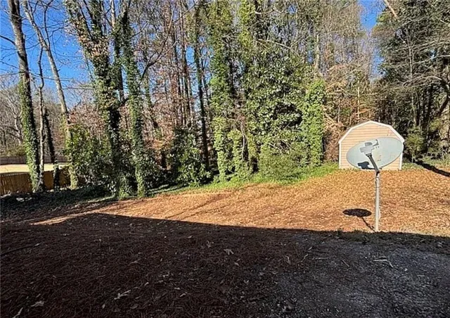 a view of outdoor space and yard