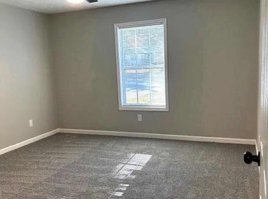 586 Ridge Avenue Mableton, GA 30126 - Photo 7 of 12 an empty room with a window