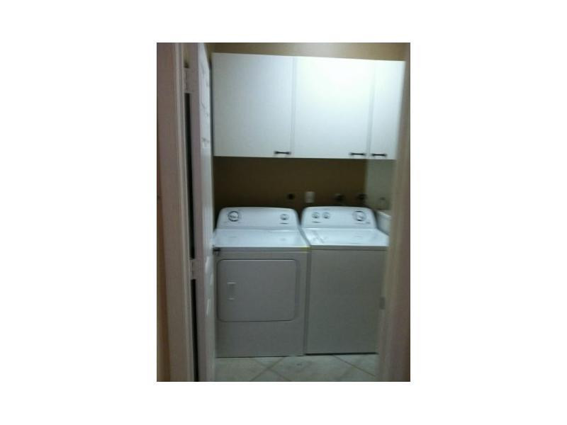 Undisclosed Address Boca Raton, FL 33428 - Photo 6 of 11 Laundry Room