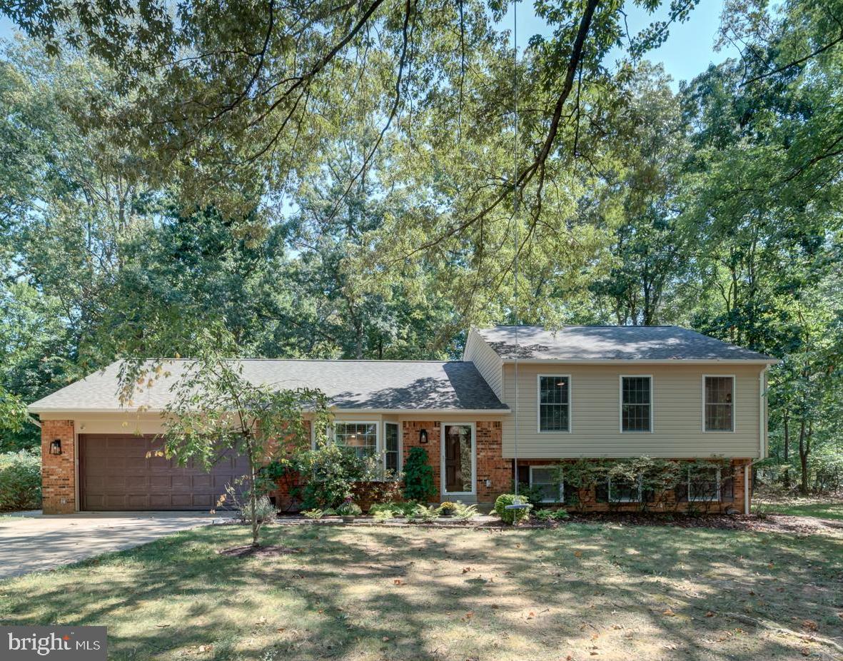 12356 Lima Lane Reston, VA 20191 - Photo 1 of 44 front view of a house with a patio
