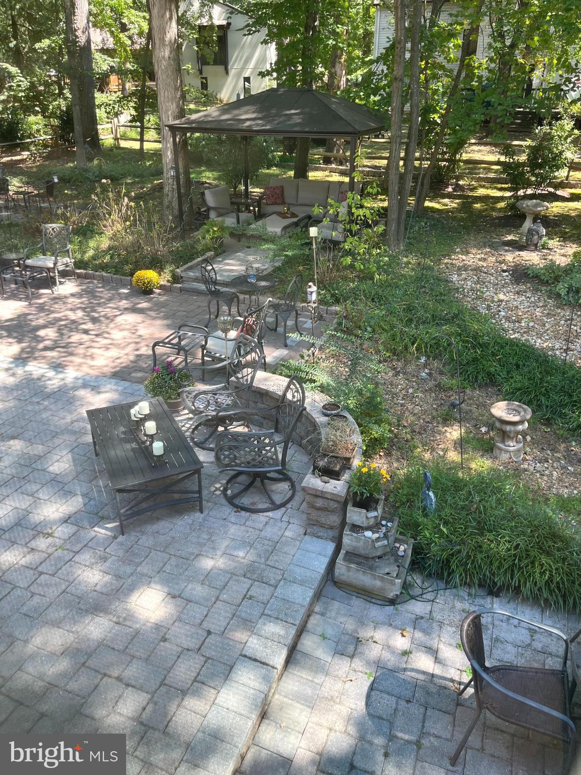 12356 Lima Lane Reston, VA 20191 - Photo 39 of 44 a backyard of a house with table and chairs