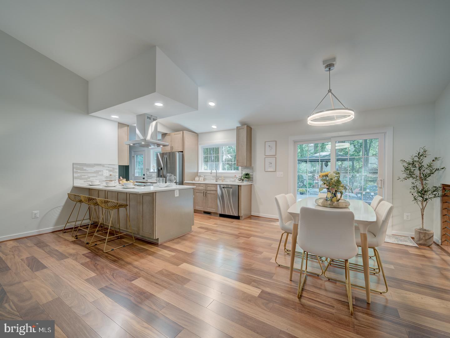 12356 Lima Lane Reston, VA 20191 - Photo 5 of 44 a kitchen with a table and chairs in it