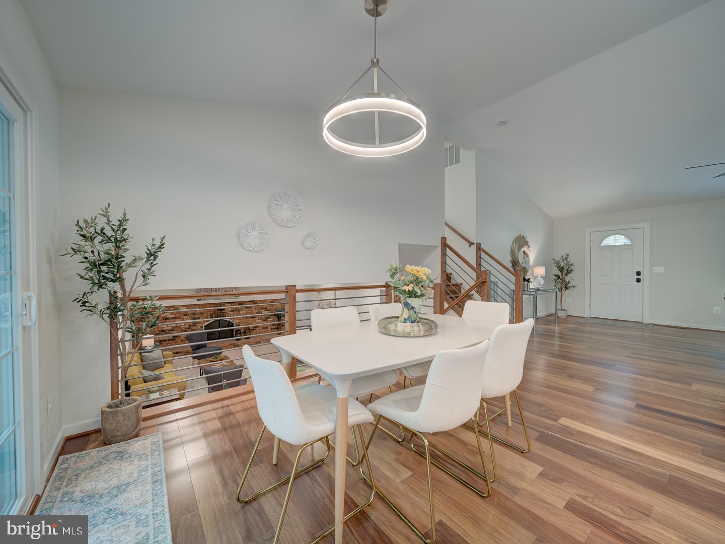 12356 Lima Lane Reston, VA 20191 - Photo 7 of 44 a view of a dining room with furniture and wooden floor