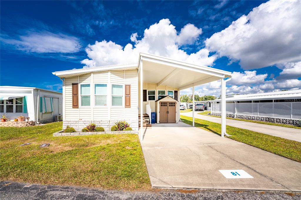 a view of a patio with swimming pool
