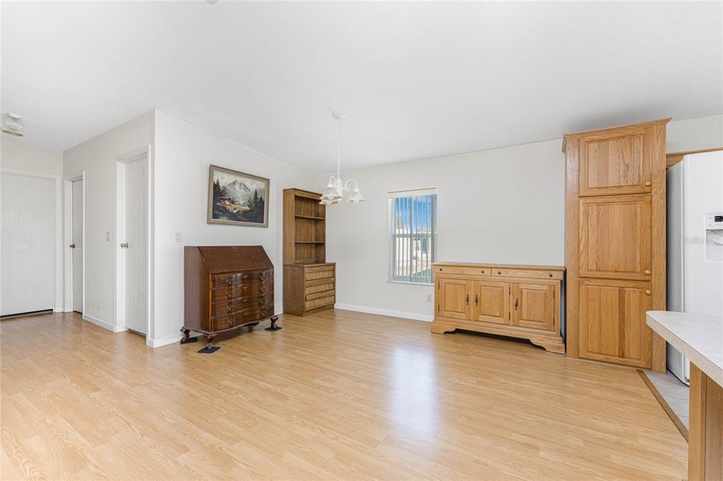 1891 Englewood Road, Unit 81 Englewood, FL 34223 - Photo 17 of 53 a view of livingroom with furniture and fireplace