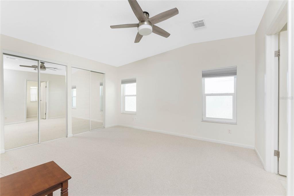 1891 Englewood Road, Unit 81 Englewood, FL 34223 - Photo 26 of 53 a view of an empty room with a window