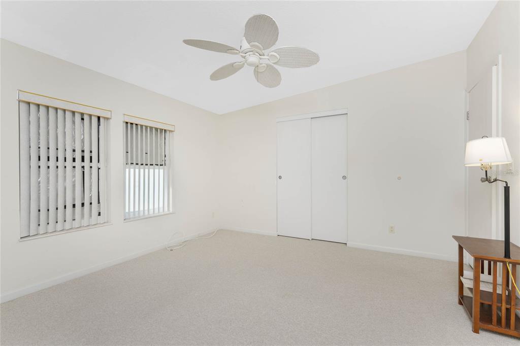 1891 Englewood Road, Unit 81 Englewood, FL 34223 - Photo 30 of 53 a view of an empty room with a window