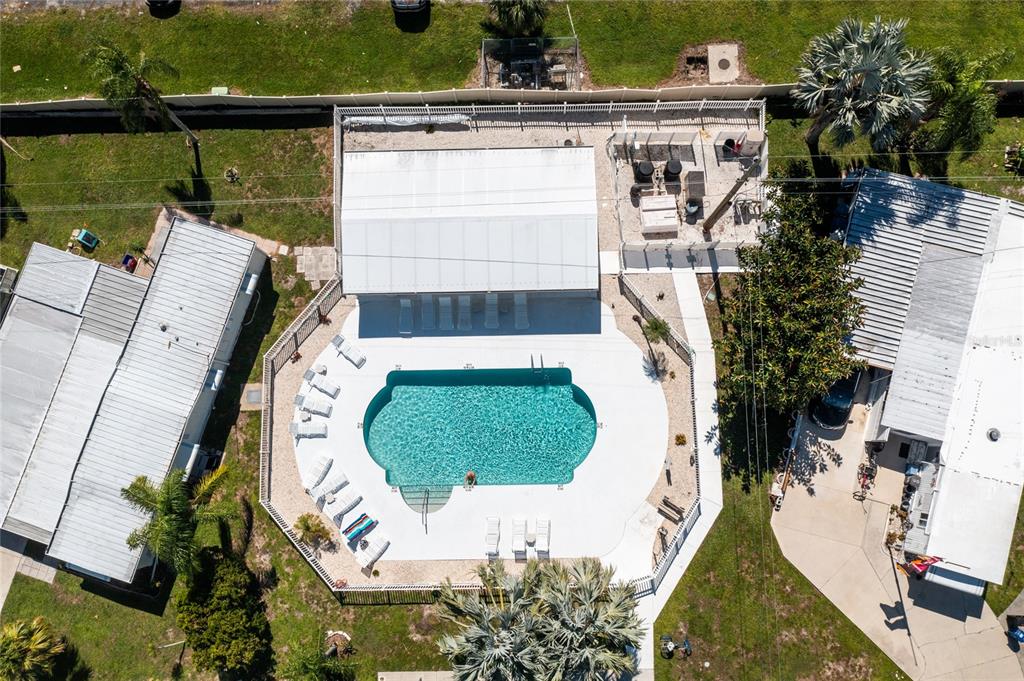 1891 Englewood Road, Unit 81 Englewood, FL 34223 - Photo 38 of 53 an aerial view of a house having outdoor seating
