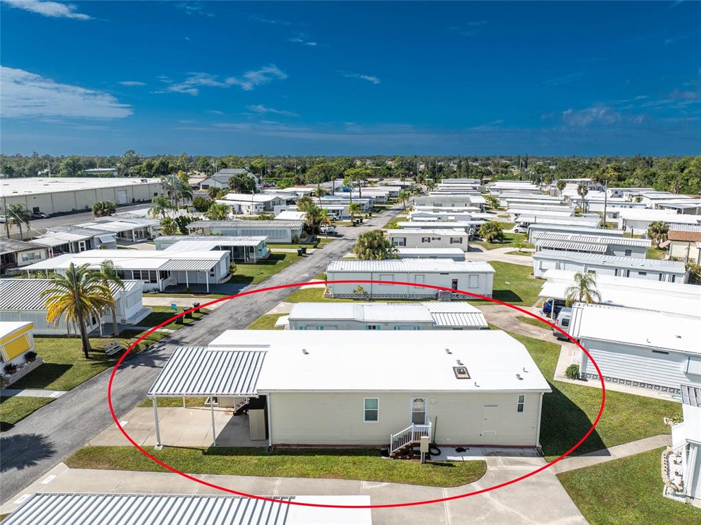 1891 Englewood Road, Unit 81 Englewood, FL 34223 - Photo 47 of 53 a view of a swimming pool with a patio