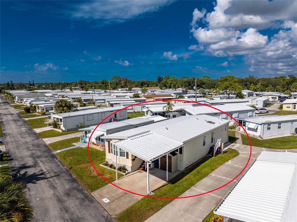1891 Englewood Road, Unit 81 Englewood, FL 34223 - Photo 5 of 53 a view of a balcony with chairs