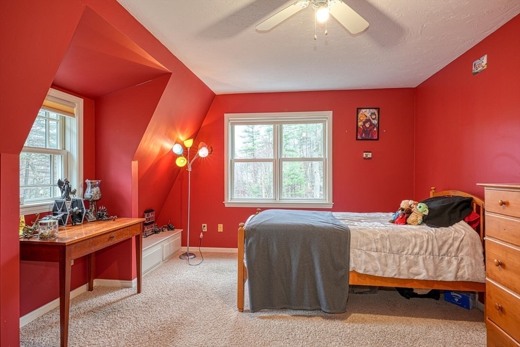 60 Coal Kiln Road Princeton, MA 01541 - Photo 22 of 31 a bedroom with a bed and a window