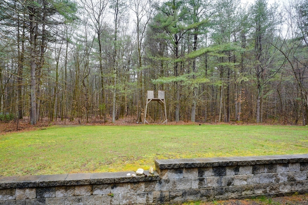 60 Coal Kiln Road Princeton, MA 01541 - Photo 26 of 31 a view of a swimming pool with a big yard and large trees