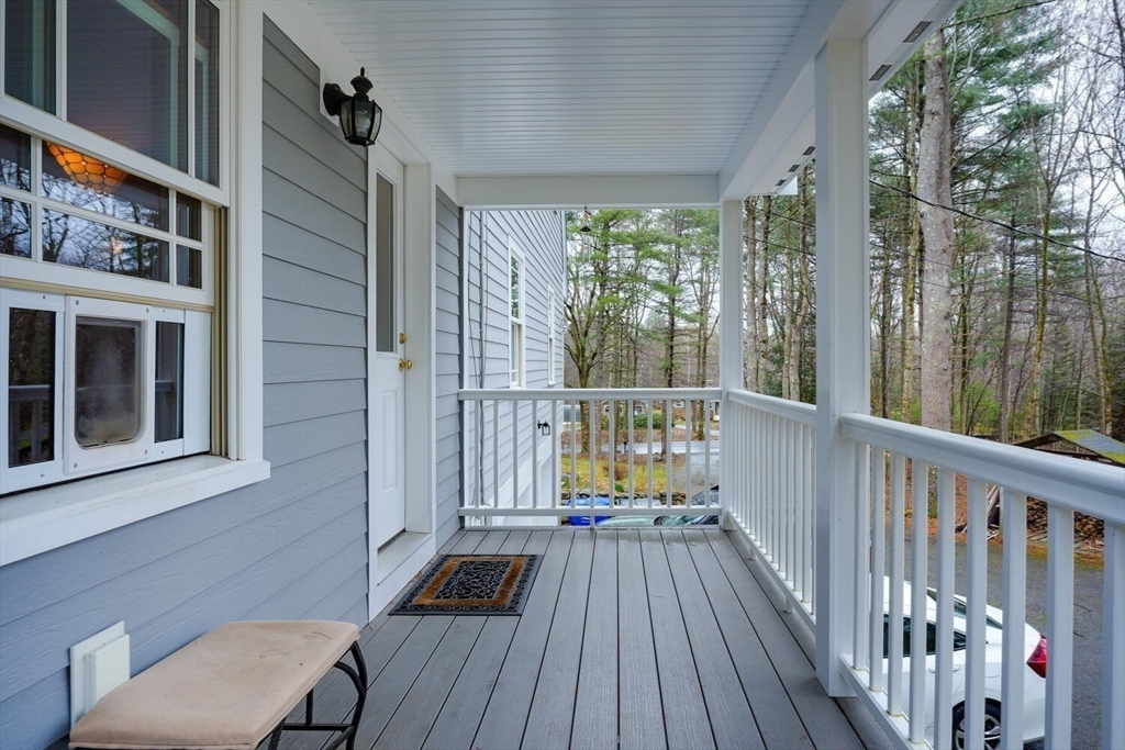 60 Coal Kiln Road Princeton, MA 01541 - Photo 28 of 31 a view of a balcony with wooden floor and fence