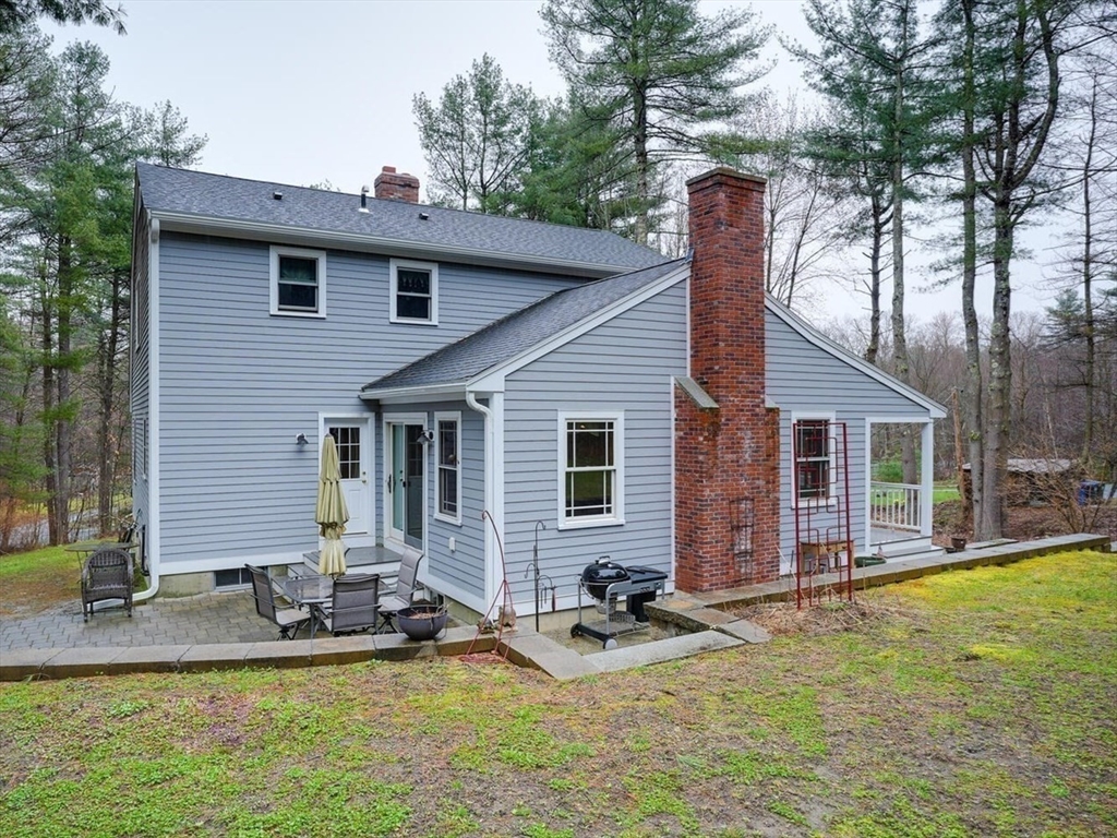 60 Coal Kiln Road Princeton, MA 01541 - Photo 29 of 31 a view of a house with backyard porch and sitting area