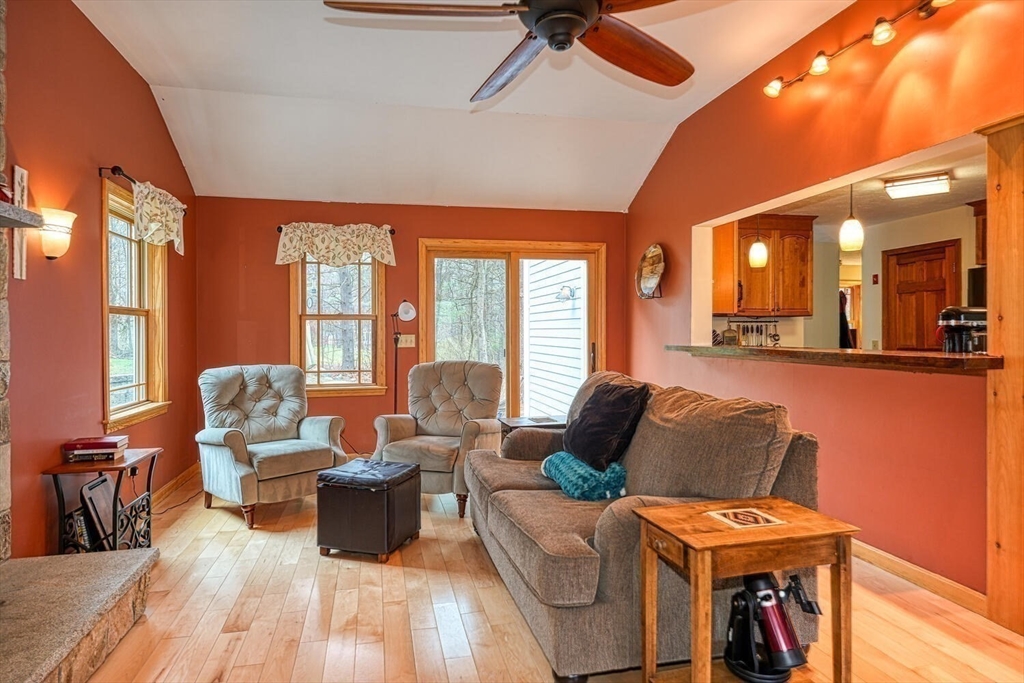 60 Coal Kiln Road Princeton, MA 01541 - Photo 9 of 31 a living room with furniture and a fireplace