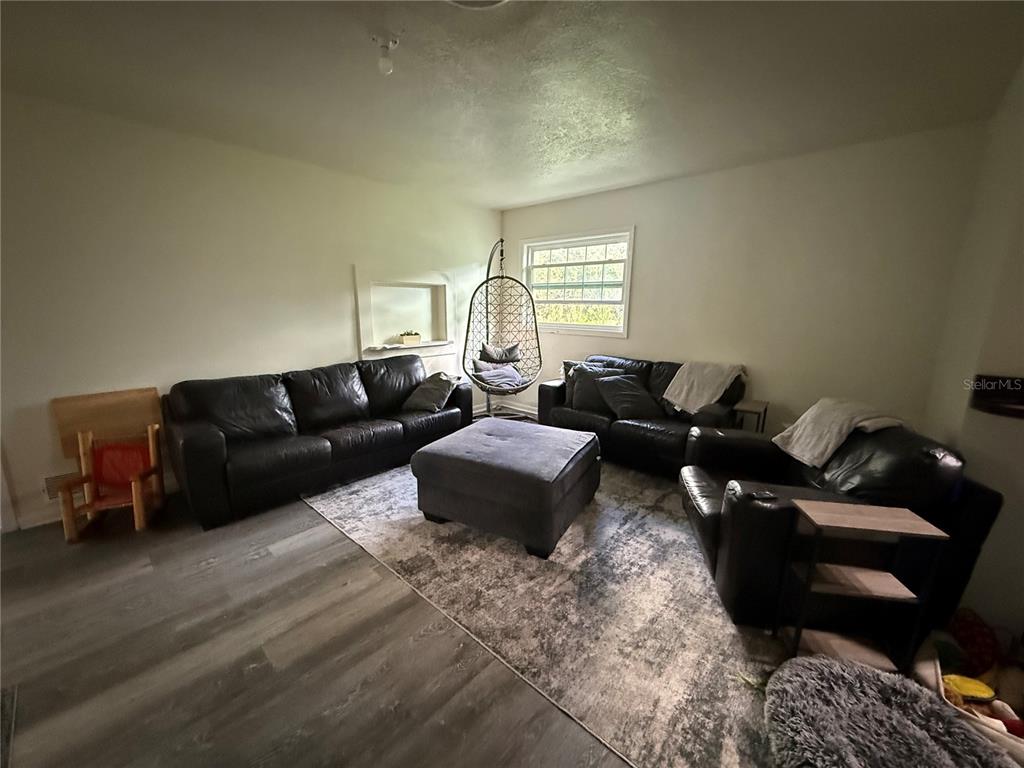 1021 Southwest 26th Street Ocala, FL 34471 - Photo 3 of 10 a living room with furniture