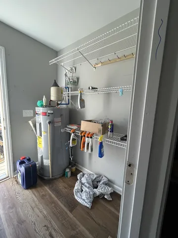 a house view with a sitting space and garden