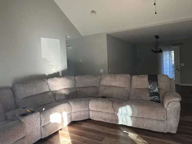 a living room with furniture and a couch