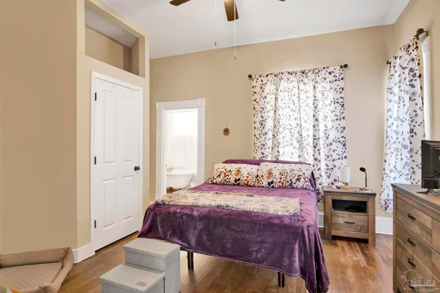 a bedroom with a bed and a cabinets