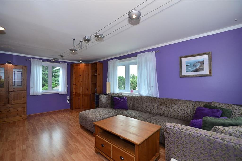 12780 Ridge Road North Huntingdon, PA 15642 - Photo 2 of 21 The large 18x12 Living Room has beautiful new floors and lighting fixtures . The room was recently remodeled and updated.