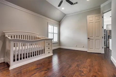 an empty room with wooden floor