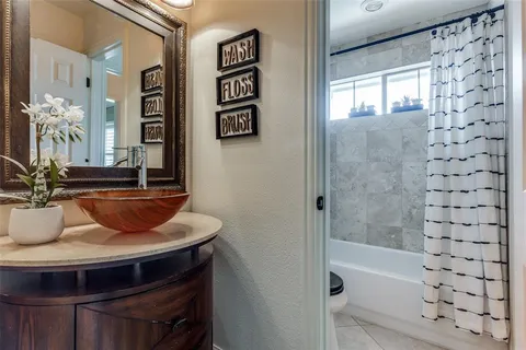 a bathroom with a sink and a bathtub