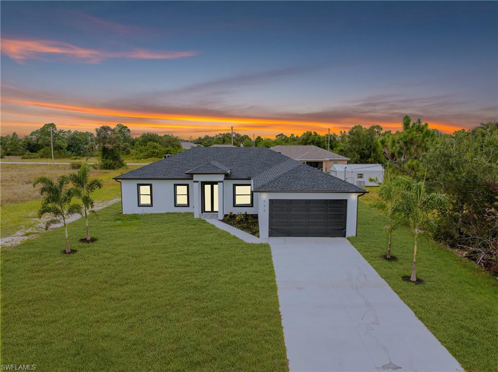 a house view with a garden space