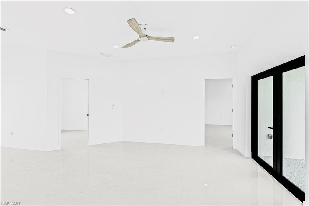 343 Pullman Street Lehigh Acres, FL 33974 - Photo 14 of 43 a view of an empty room