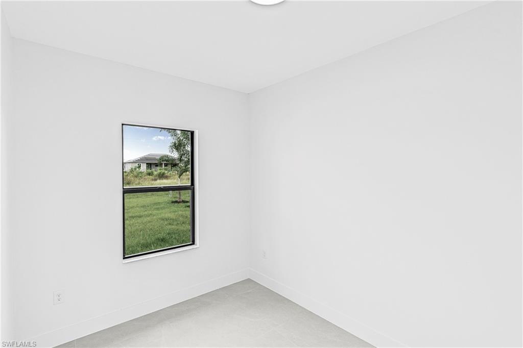 343 Pullman Street Lehigh Acres, FL 33974 - Photo 22 of 43 a small space with a window