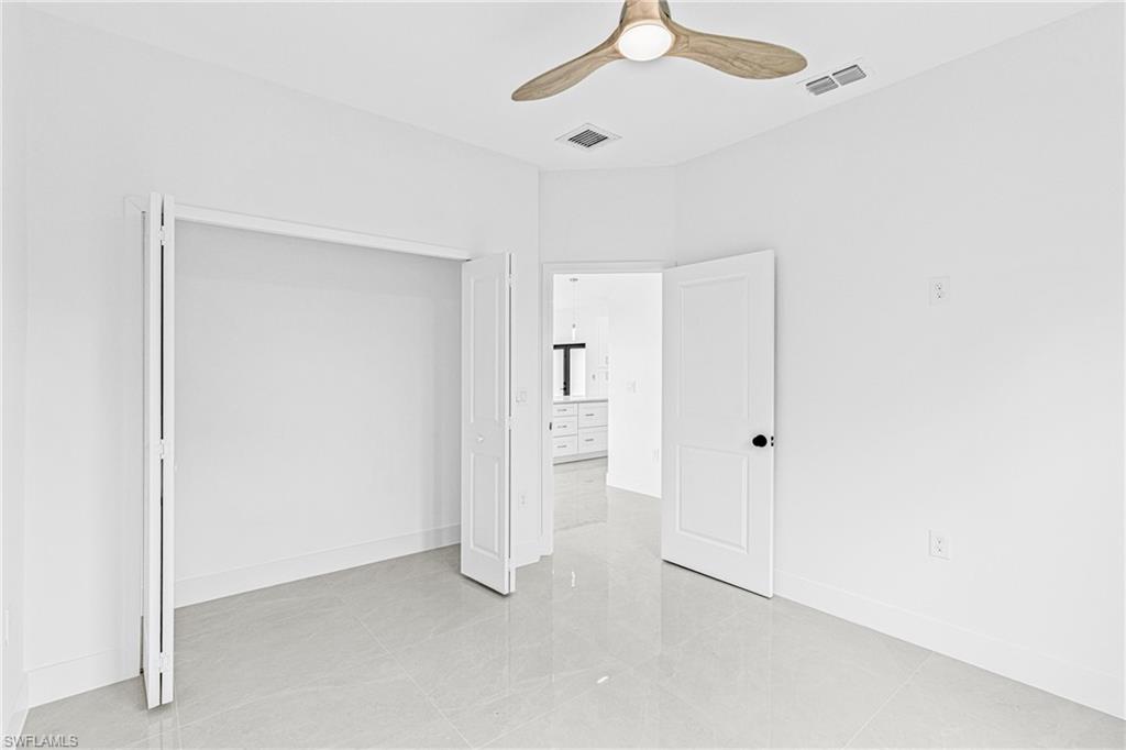 343 Pullman Street Lehigh Acres, FL 33974 - Photo 24 of 43 a view of an empty room