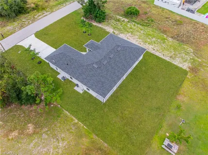 a view of a yard with an outdoor space