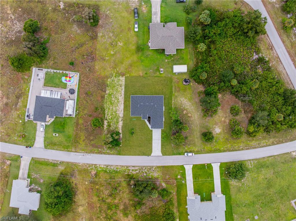 343 Pullman Street Lehigh Acres, FL 33974 - Photo 39 of 43 view of a city from a balcony