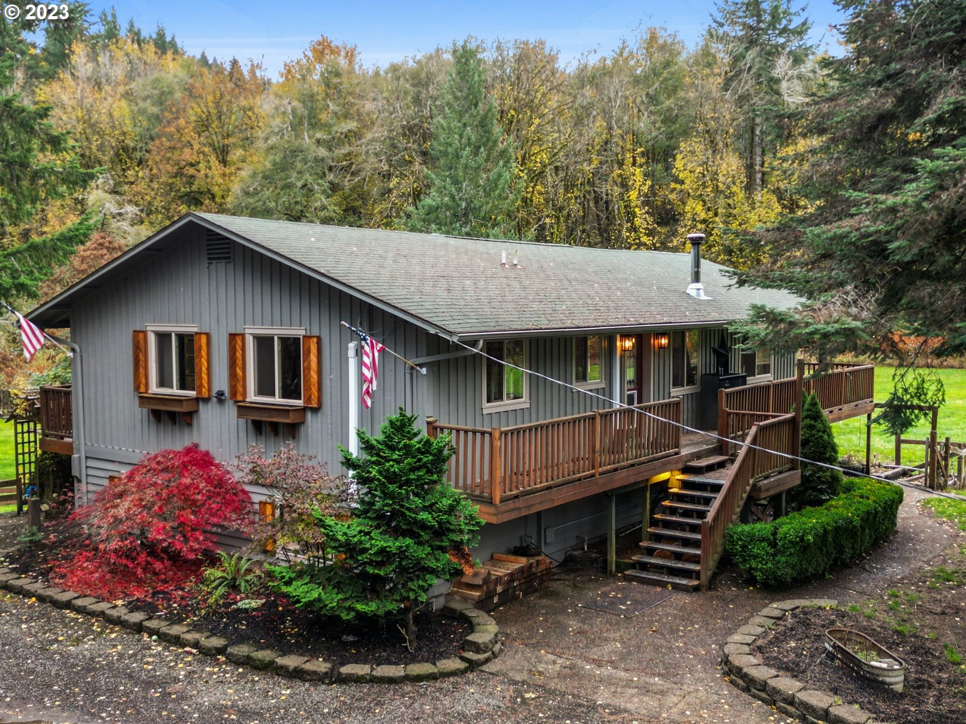 54795 Southwest Hebo Road Grand Ronde, OR 97347 - Photo 1 of 41 a front view of a house with garden