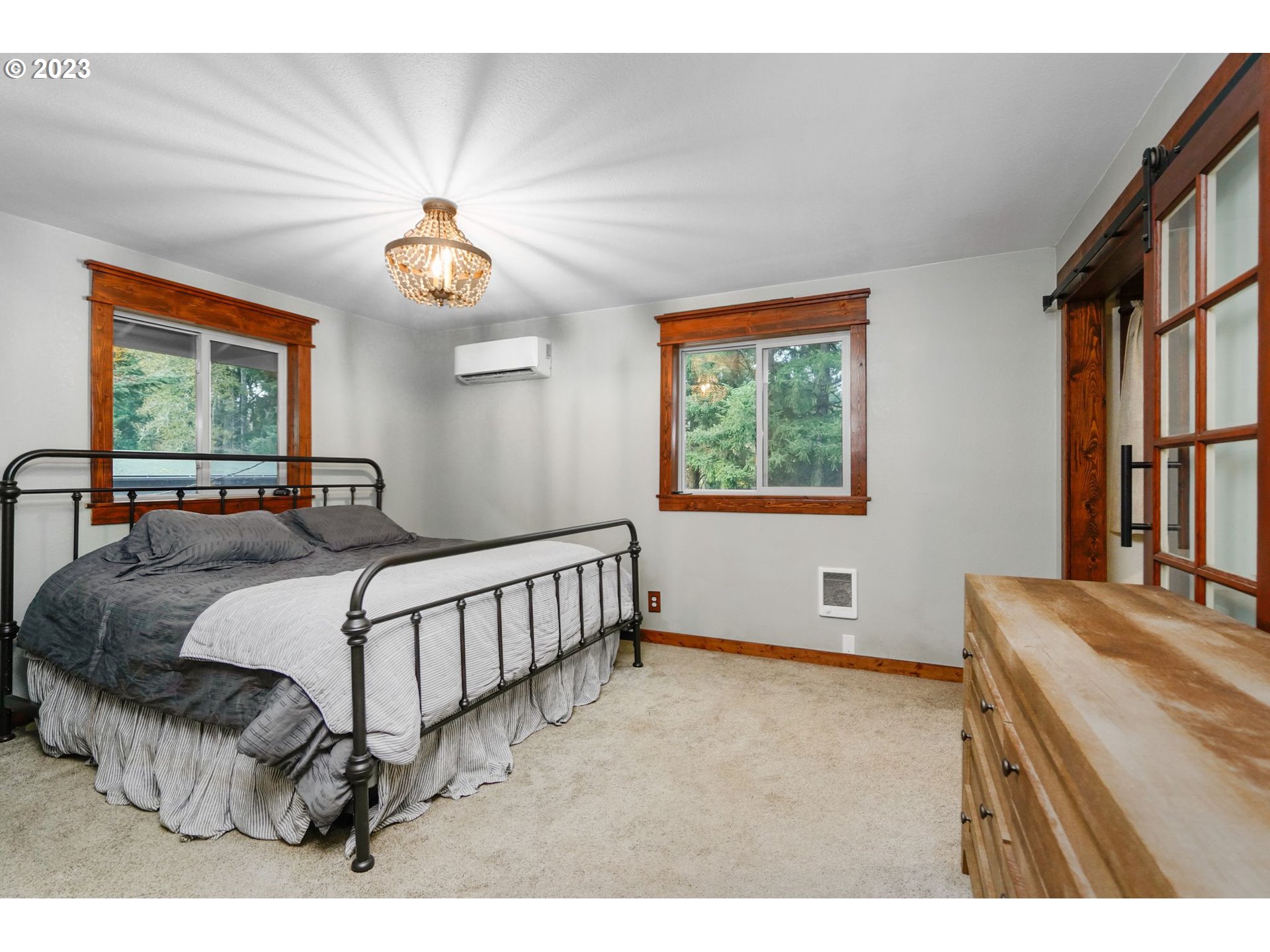 54795 Southwest Hebo Road Grand Ronde, OR 97347 - Photo 16 of 41 a bedroom with a bed and a window