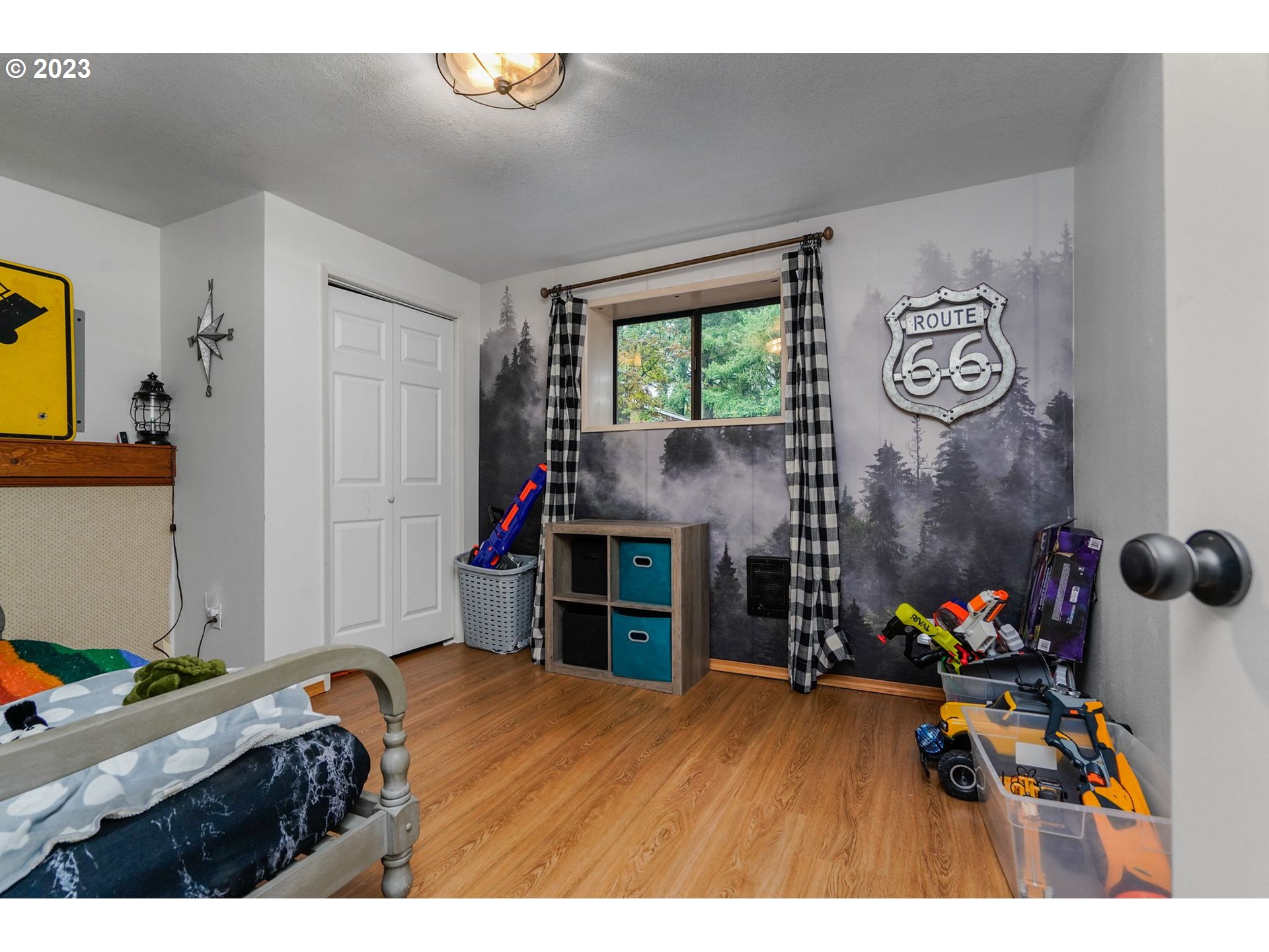 54795 Southwest Hebo Road Grand Ronde, OR 97347 - Photo 20 of 41 a living room with furniture and a flat screen tv